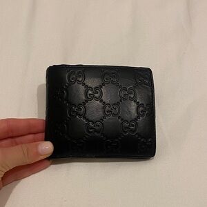 Gucci Black Embossed GG Men’s Leather Wallet